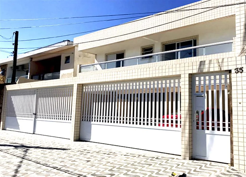 Casa 2 dormitórios à venda, 68m² por R$ 378.000,00 - Tude Bastos - Praia Grande/SP